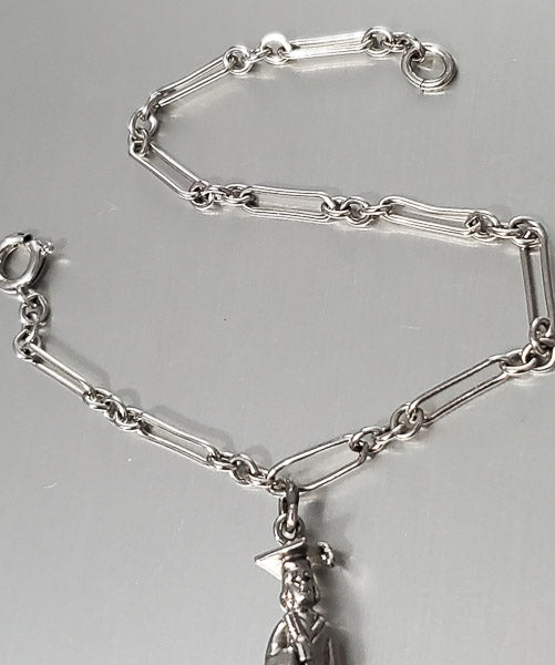 3670-Vintage Sterling Silver Charm Bracelet